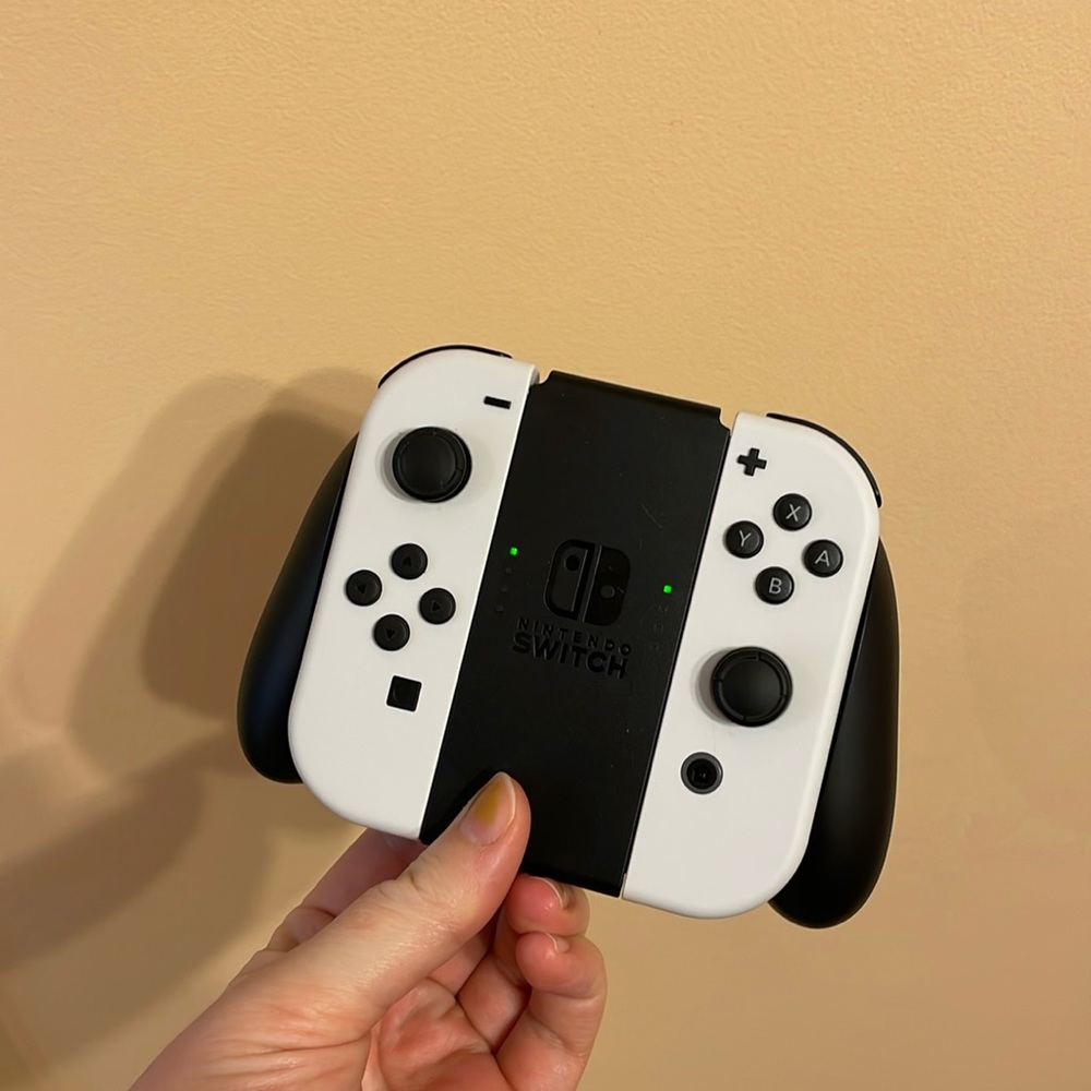 Unopened refurbished joycon grip for the Nintendo switch